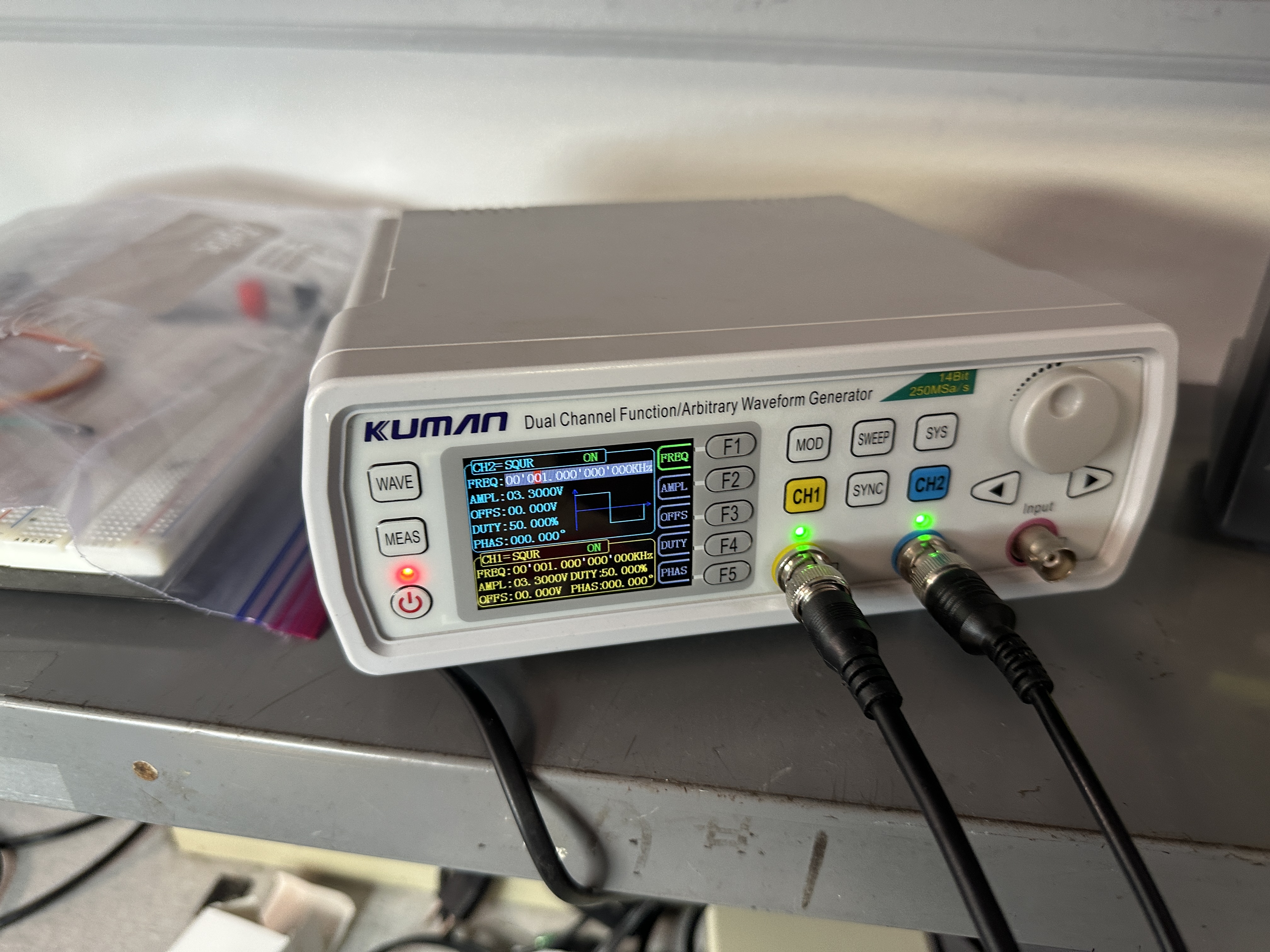 Function generator configured for a 1 kHz square wave on CH2 (PWM stand-in for MCU)