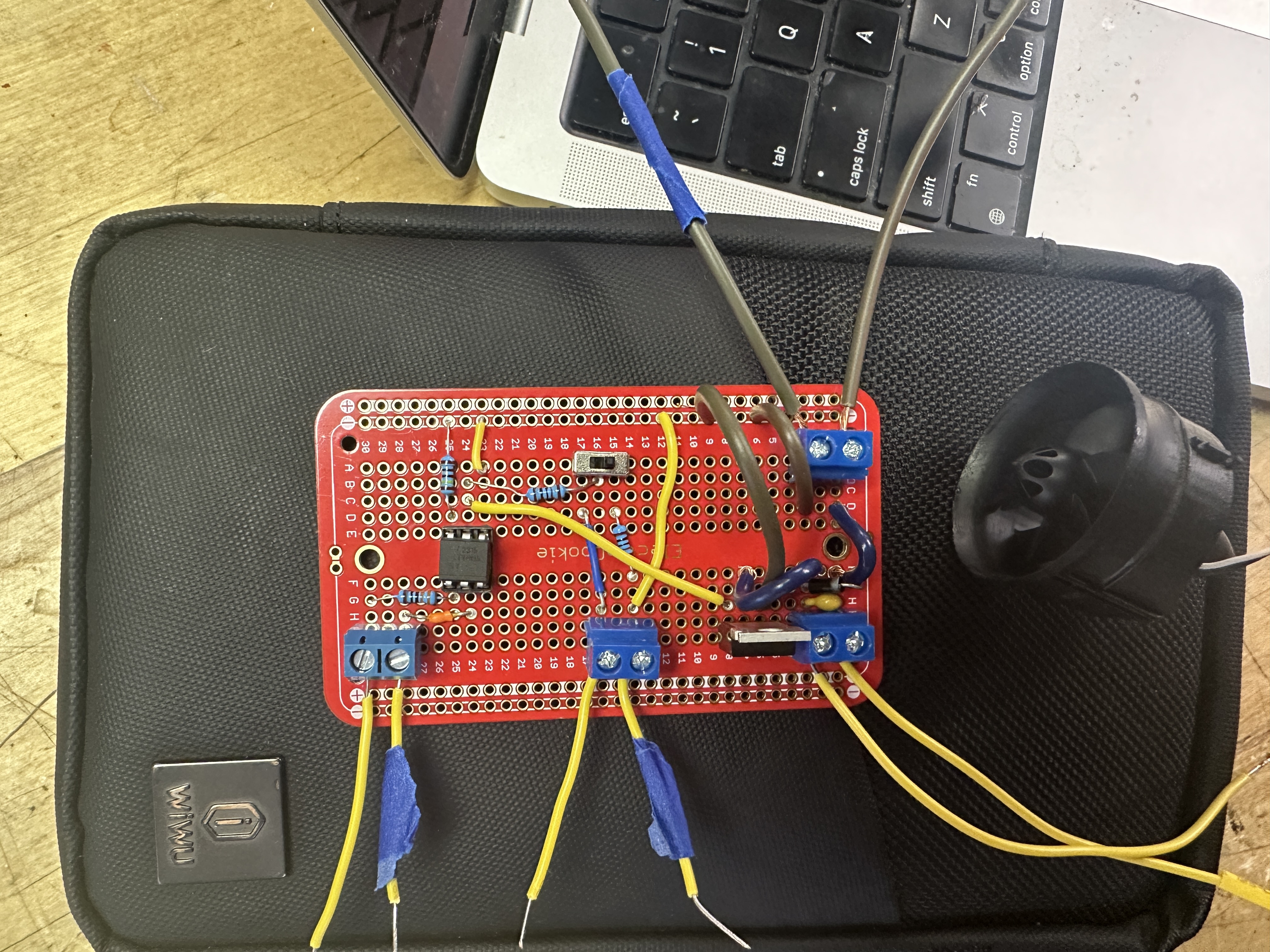 Solderboard build: 4N35 optoisolator, IRLB8721 N-MOSFET, 1N4001 snubber, 0.1 µF ceramic in parallel with motor